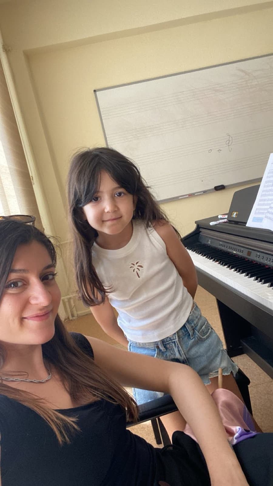 Piano lesson with young student Ada at the studio