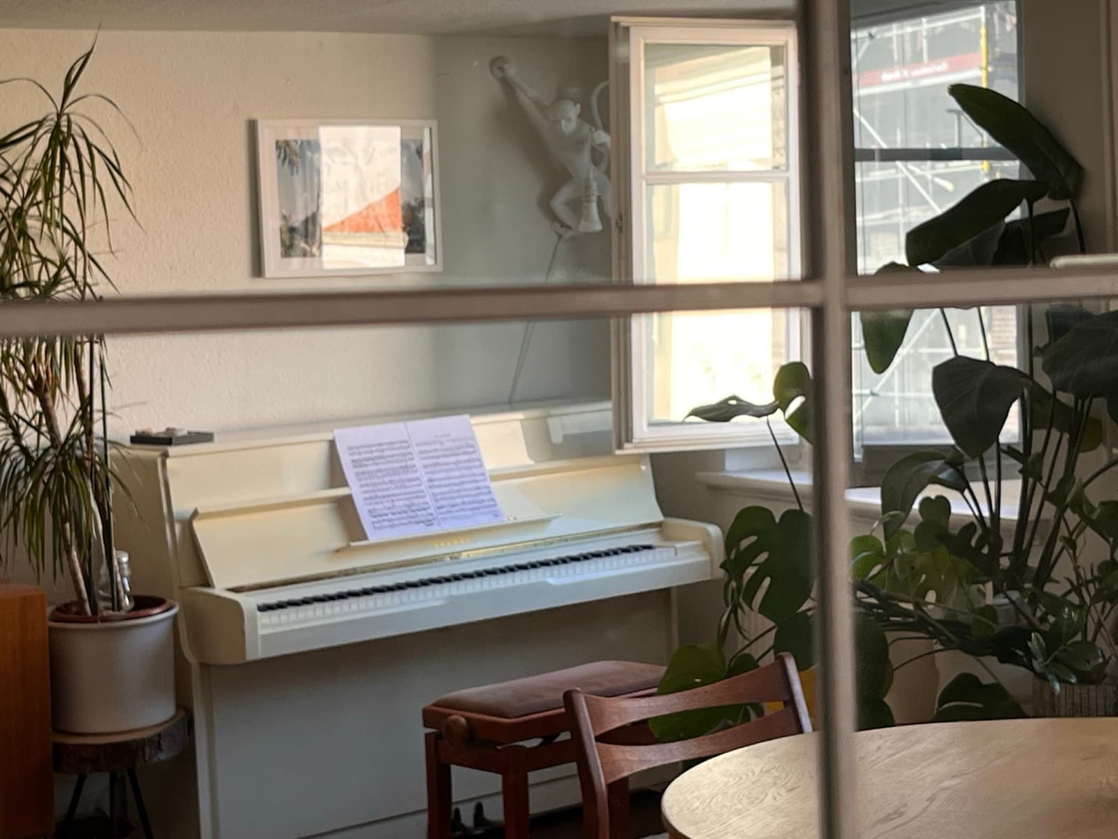 View of the studio piano through the doorway